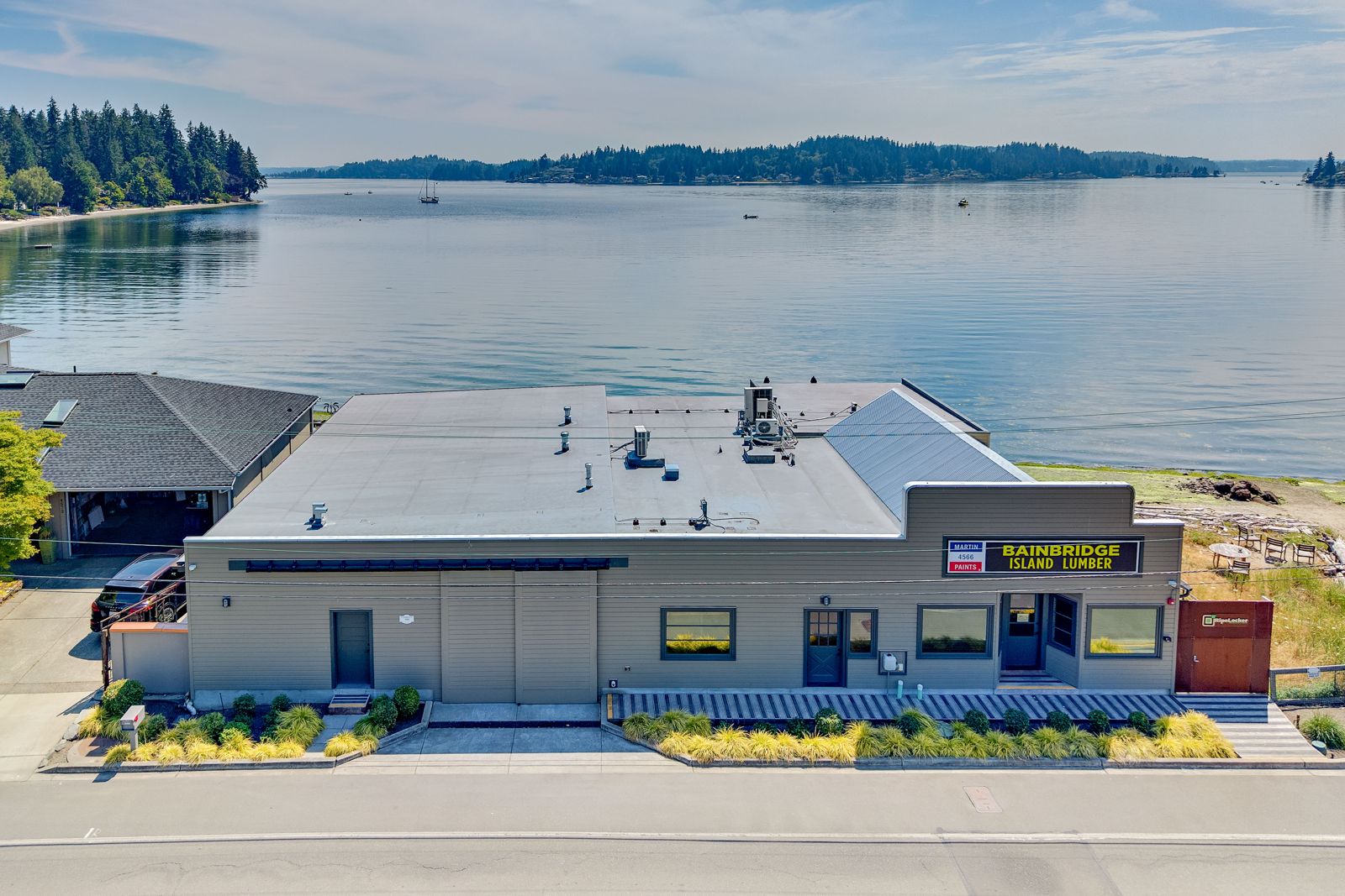 The Bainbridge Island Lumber building on the water at Point White